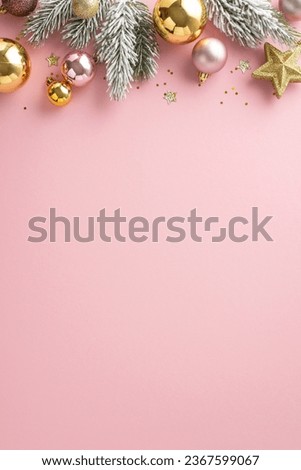 Sparkling New Year's Display: vertical top view of charming tree ornaments, shimmering star, pink and gold balls, sequins, pine twigs with frost on soft pink backdrop. Perfect for your holiday message