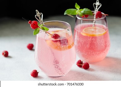 Sparkling Pink Raspberry Lemonade On Dark Background, Toned Image