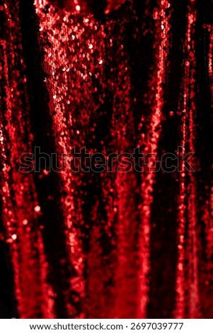 Sparkling red sequin background, featuring a shimmering red texture. Ideal for festive and glamorous designs. Vibrant color glittery design background.