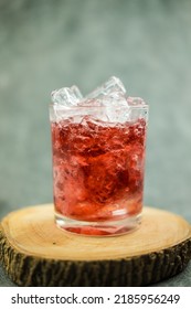 Sparkling Red Water Soda With Ice Cubes. Summer Iced Drink, Homemade Summer Drink.