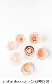 Sparkling Rose Wine In Different Glasses On White Background