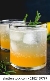 Sparkling Rosemary-Lemon Bourbon Cocktail: American Whiskey Cocktails Served Over Ice With A Rosemary Garnish