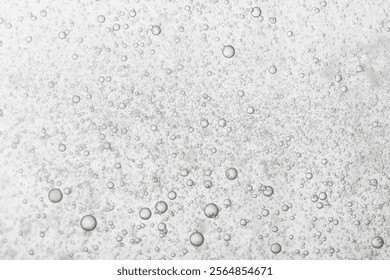 Sparkling water poured in a glass. Bubbles, fizz. - Powered by Shutterstock