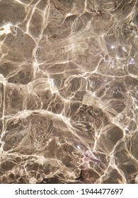 Sparkling Water Surface With Sun Reflection