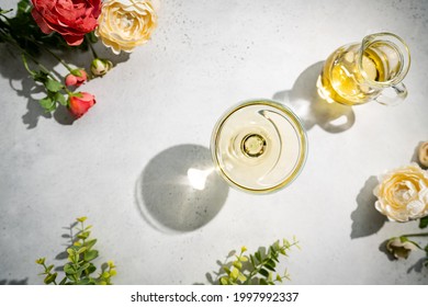 Sparkling Wine Or Champagne Glasses On White Background With Sharp Shadows, Top View. Modern, Stylish Color Concept