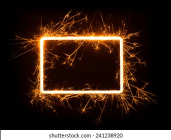 Sparkly glowing empty rounded corner rectangle frame with copy space on dark background.