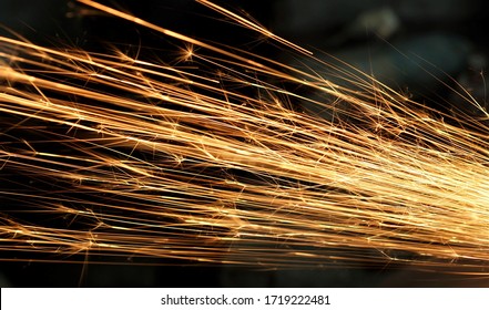 sparks bouncing from sharpening  stone