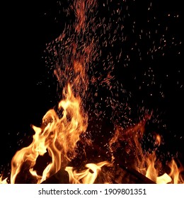 Sparks and Flames Of Fire Isolated On Black Background. Abstract Flaming Sparks Background. Magic Fiery Wallpaper. Flying Sparks Pattern,  Closeup View. Bonfire Flaming In The Night. Energy Concept. - Powered by Shutterstock