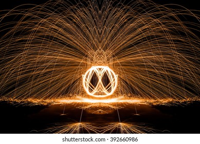 Sparks Flying Off Burning Steel Wool
