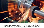 sparks flying while machine griding and finishing metal