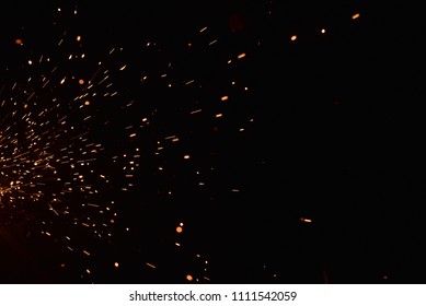 Sparks On Black Background From Welding Of Steel