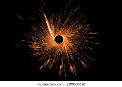 Sparks from steel wool on a background of the night sky. Long exposure. - Powered by Shutterstock