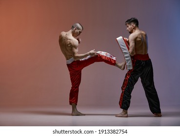 Sparring Of Boxers Two Fighting Males In Boxing Gloves During Battle, Martial Arts, Mixed Fight Concept