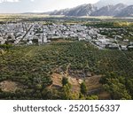 Sparta. Ruins of ancient Sparta and mountains and modern city in the background. Peloponnese, Laconia, Greece