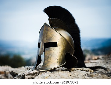 Spartan helmet on rocks