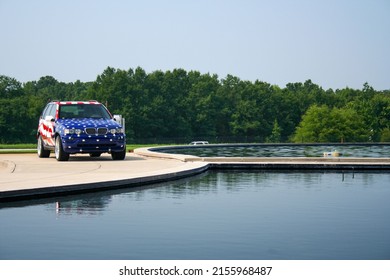 SPARTANBURG, UNITED STATES - Aug 03, 2006: A 2006 BMW X5 Painted In The American Flag, Assembled In The USA, Parked On The Curb Outside BMW's South Carolina Manufacturing Plant