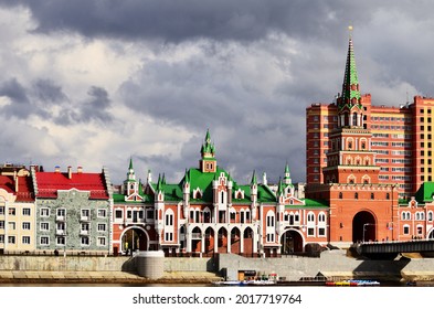 Spasskaya Tower and the wedding palace building in front of the theatre bridge. Russia Yoshkar Ola 01.05.2021. High quality photo