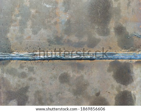Spatter and porosity on welded, Defect of welding process Flux Cored Arc Welding (FCAW)