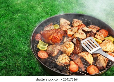 Spatula, BBQ Assorted Meat And Vegetables On The Hot Flaming Grill. Summer Outdoor BBQ Party Or Picnic Concept. - Shutterstock ID 284175164