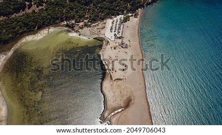 Spawning place of loggerhead turtles; Iztuzu beach. It is known for its blue crab and golden sands. Next to the Dalyan delta.