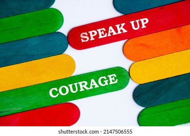 Speak Up And Courage Text On Colorful Wooden Stick - Business Concept