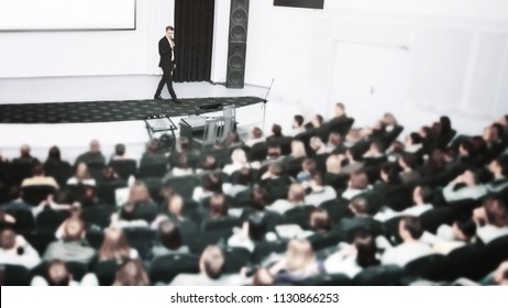 Speaker At A Business Convention And Presentations. The Audience On The Large Number Of People