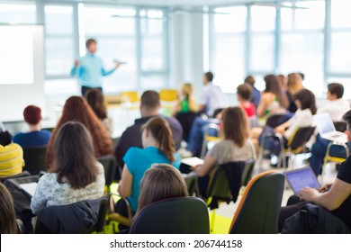 Speaker at business workshop and presentation. Audience at the conference room. - Shutterstock ID 206744158