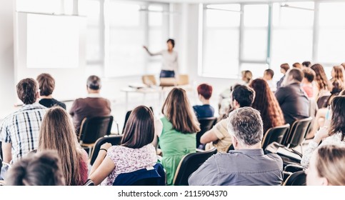 Speaker giving presentation on business conference. - Shutterstock ID 2115904370