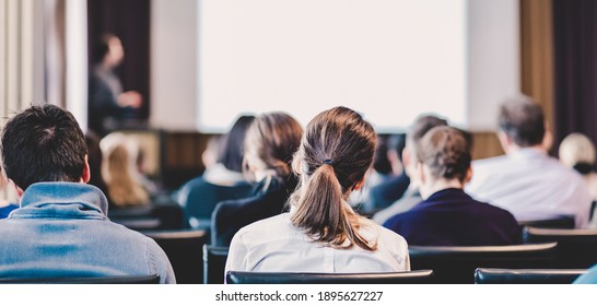 Speaker Giving a Talk at Business Meeting. Audience in the conference hall. Business and Entrepreneurship. Panoramic composition suitable for banners. - Shutterstock ID 1895627227
