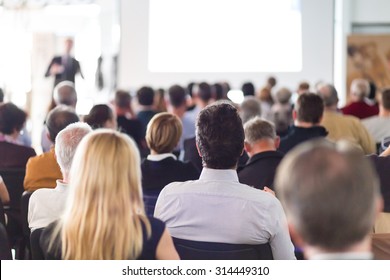 Speaker Giving a Talk at Business Meeting. Audience in the conference hall. Business and Entrepreneurship.  - Shutterstock ID 314449310