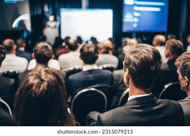 Speaker giving a talk in conference hall at business event. Rear view of unrecognizable people in audience at the conference hall. Business and entrepreneurship concept - Shutterstock ID 2315079215