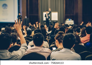 Speaker on the stage with Rear view of Audience in the conference hall or seminar meeting, business and education concept - Shutterstock ID 758264113