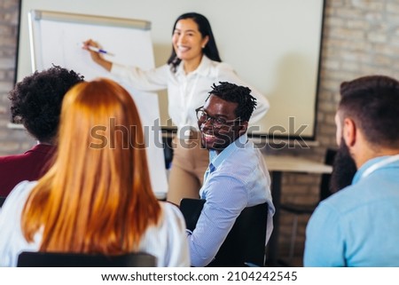 Speaker talking in seminar with many of audiences for business meeting 