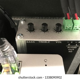 Speaker Wires Connected To The Amplifier Inside An AV Rack