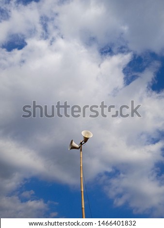 Similar – laterne (schräg) vor wolkenverhangenem himmel