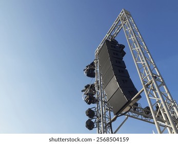 Speakers and lighting systems are basic equipment that can be found at music events.