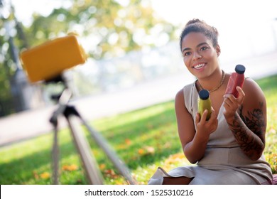 Speaking On Camera. Dark-eyed Woman Speaking About Healthy Nourishing Smoothies On Camera