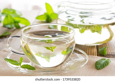 Spear Mint Tea And Tea Pod On The Table