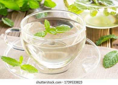 Spear Mint Tea And Tea Pod On The Table