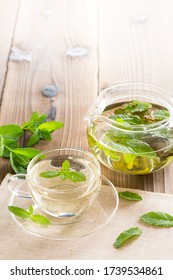 Spear Mint Tea And Tea Pod On The Table With Copy Sapce