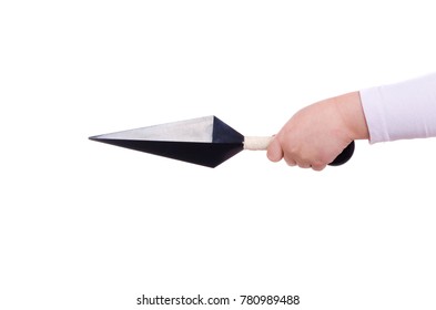 Spear Tip In The Hand Of A Little Girl On A White Background