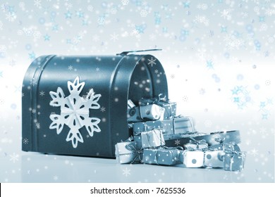 Special Delivery: A Wintry Mailbox Spilling Over With Gifts And The Magic Of The Holiday Season.