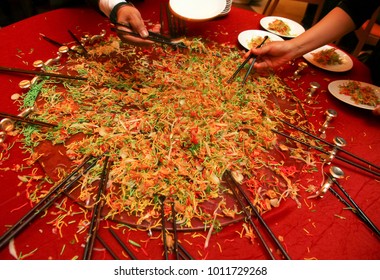 A special dish during Chinese New Year, Yusheng or Yee Sang. Chinese belief eating Yee Sang will give good luck and prosperity.