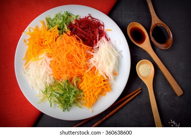 A special dish during Chinese New Year called Yusheng or Yee Sang. 