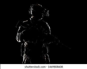Special forces fighter in darkness studio shoot