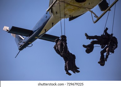 Special Forces Team Helicopter Rope Jump, Unmarked And Unrecognizable Swat Team