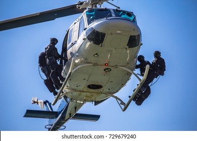 Special Forces Team Ready For Helicopter Rope Jumping, Unmarked And Unrecognizable Swat Team