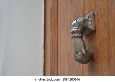 A Special Hand With Ball Door Knocker.