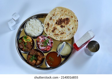 Special Indian Chicken Thali Isolated On White Plate.