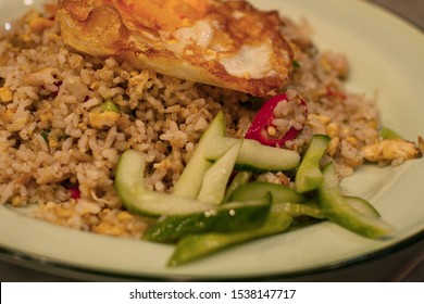 Special Kaempferia Galanga, Nasi Goreng Kencur Fried Rice Served With Eggs And Pickles